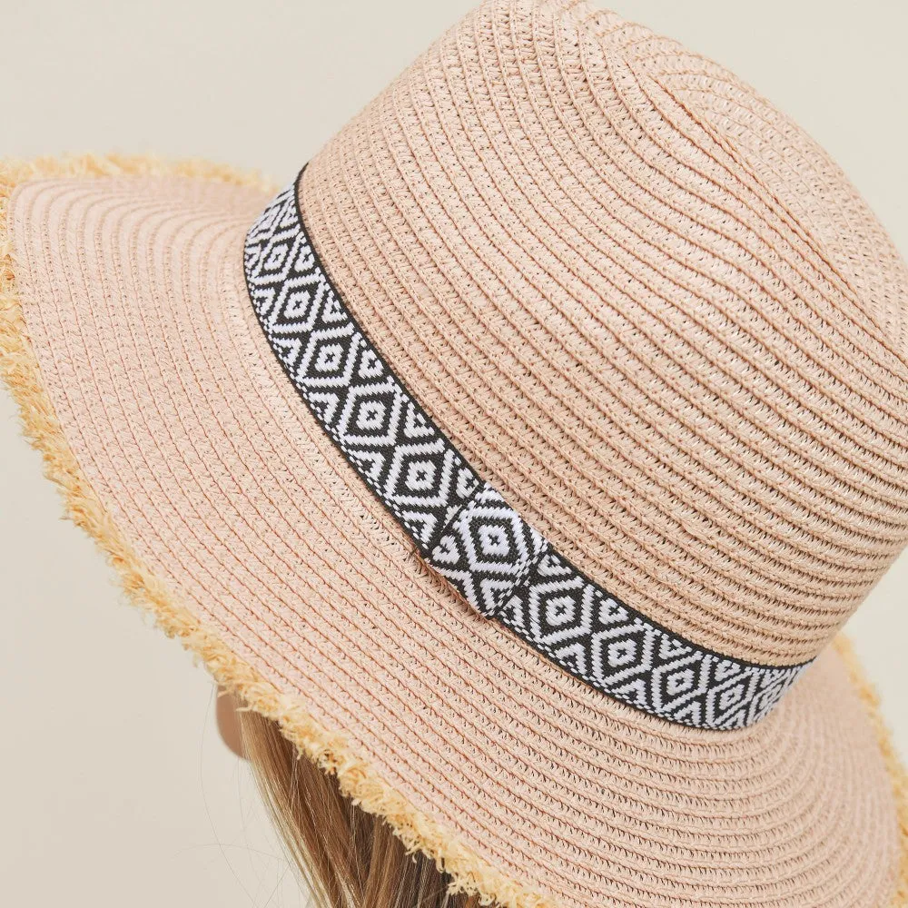 BLUSH STRAW PANAMA HAT WITH BLACK AND WHITE AZTEC BAND AND FRAYED EDGES